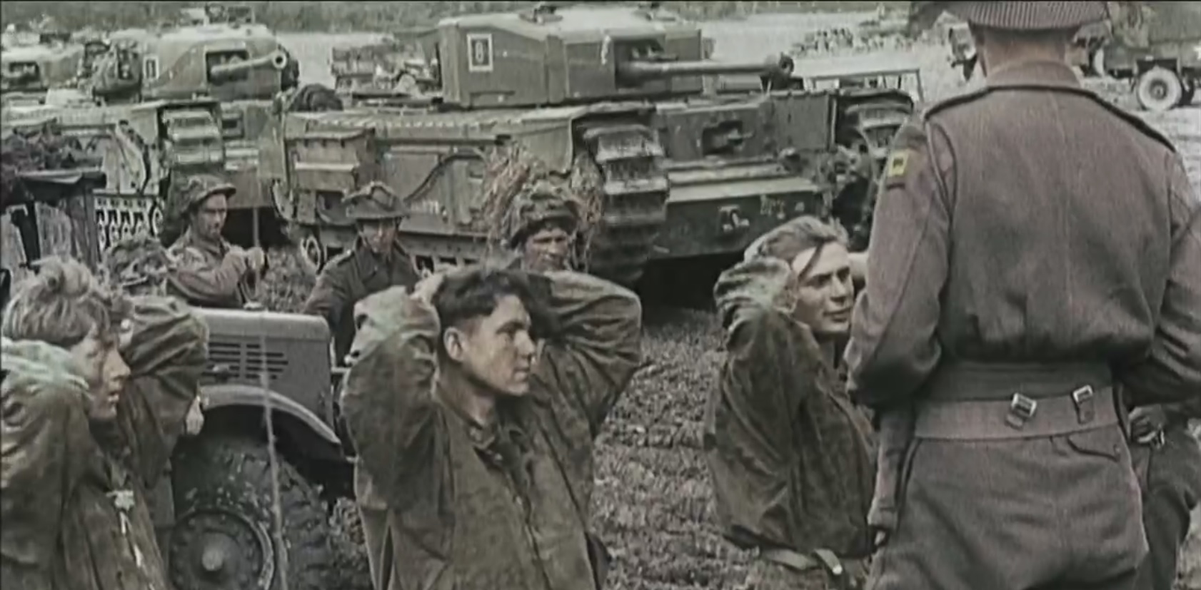 German soldiers being taken as prisoners of war.