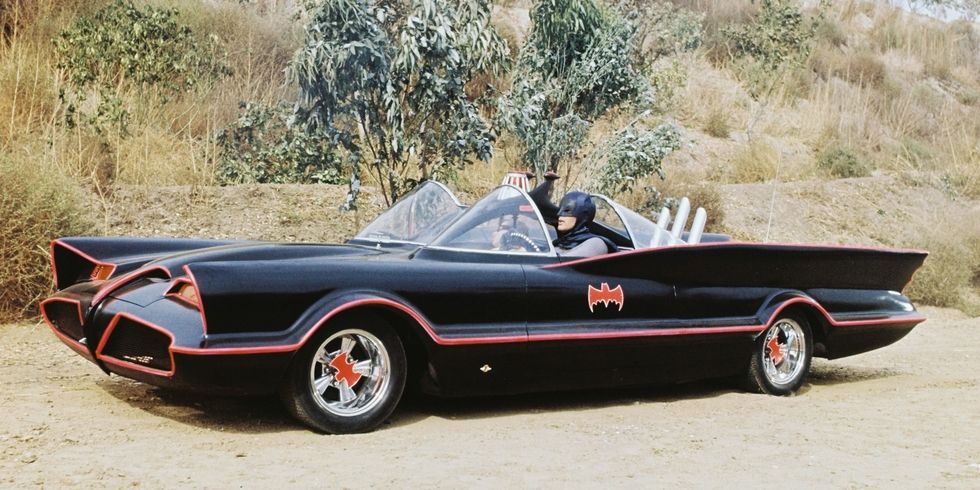 Adam West and Burt Ward TV's Batman and Robin in the George Barris-designed Batmobile, circa 1966