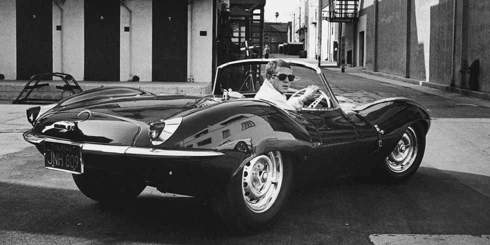 Actor Steve McQueen driving his Jaguar XK SS in California, June 1963